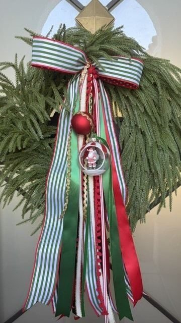 Festive greenery with custom ribbon tails
